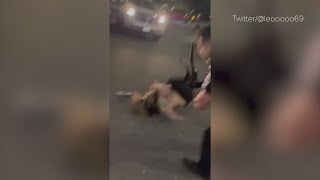 Viral video shows security guard slamming woman to the pavement in parking lot brawl [upl. by Aowda]