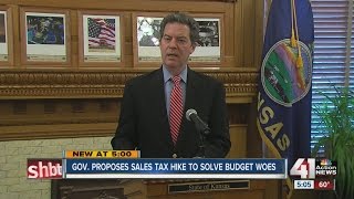 Brownbacks tax proposal includes increase in sales tax tax exemption for lowest earners [upl. by Sparkie]