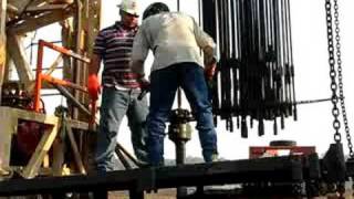 Connecting and Running Rods Back In Oil Well [upl. by Standford]