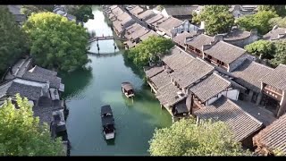 Visiting Chinas 1300yearold water town Wuzhen [upl. by Mandler]