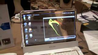 Transparent OLED Screen for Samsung Notebooks  CES 2010 [upl. by Rimaa]