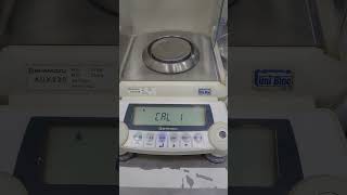 AUX220 Shimadzu weighing scale calibration [upl. by Attela]