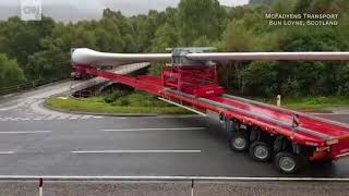 WATCH Remarkable maneuver of trailer turning Scotland wind turbine over bridge [upl. by Nnanaej]