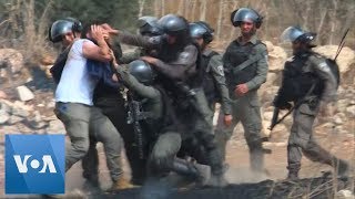 Palestinians Protesting Jewish Settlements Clash with Israeli Forces in West Bank  VOANews [upl. by Llennaj129]