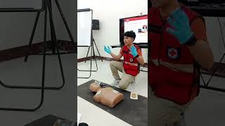 How to put AEDAutomated External DefibrillatorRed Cross Training [upl. by Ahsenod516]