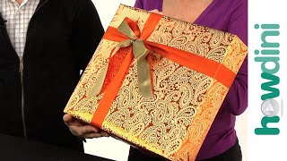 How to tie a ribbon onto a gift box [upl. by Ender721]