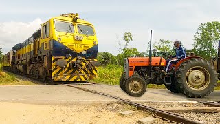 Train vs Tractor HUGE Train Crossing at UNMANNED Railroad Crossing  NO GATES OR BELLS [upl. by Cyd]