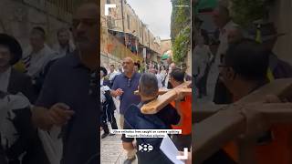 Ultraorthodox Jews spit towards Christian pilgrims leaving Church of the Flagellation [upl. by Nnylharas228]