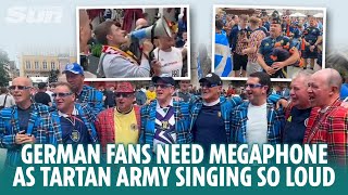 German fans need a megaphone as they are drowned out by Tartan Army singing [upl. by Adyol]