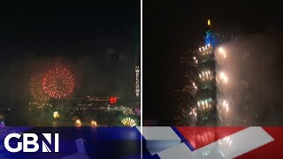 Hong Kong and Taiwan ring in 2024 with INCREDIBLE displays of fireworks [upl. by Avrit]