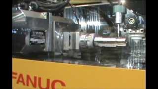 MMK Matsumoto Submersible EDM Indexer MDHW100L on Fanuc RoboCut Wire EDM  IMTS 2012 [upl. by Alejandra]