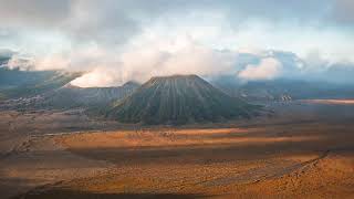 Smoking volcano at sunrise Bromo  Tengger Semeru National Park East Java Indonesia [upl. by Leidag962]