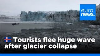 Watch Tourists flee large wave after Icelandic glacier collapse  euronews 🇬🇧 [upl. by Assirrec]