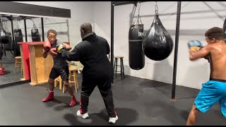 THE GRADY TWINS PERFORM HAND PAD DRILL amp WRECKING THE AQUA BAG AT J PRINCE BOXING GYM  TRAINING [upl. by Ullund873]