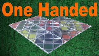 Trying to Solve a Rubiks Magic One Handed [upl. by Salkin]