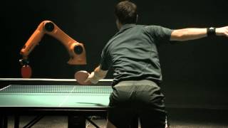 The Duel Timo Boll vs KUKA Robot [upl. by Adnauqal431]