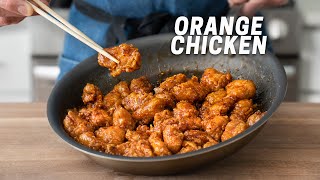 CRISPY TAKEOUT ORANGE CHICKEN No Wok Required [upl. by Eiramlatsyrc]