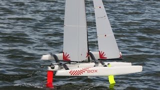 Foiling  radio controlled One Metre trimarans with Z and kinked foils [upl. by Onabru596]