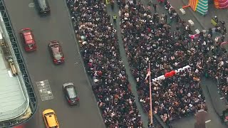 Crowds gather in Times Square for surprise from BTS member Jung Kook [upl. by Yesnnyl961]