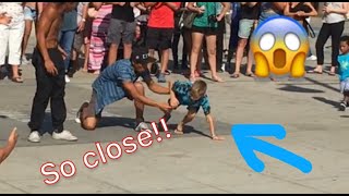 7 year old surprises street performers with a backflip [upl. by Dammahum986]