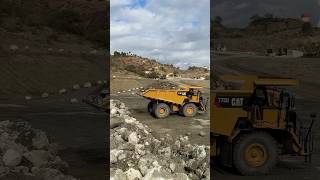 unloading Highway Dump Truck 775G Caterpillar excavator hddump dumptruck tambang caterpillar [upl. by Thilde]