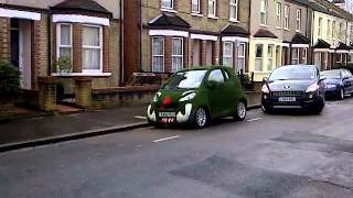 SMART CAR COVERED WITH GRASS Astro grass car ASTROTURF CAR [upl. by Larson]