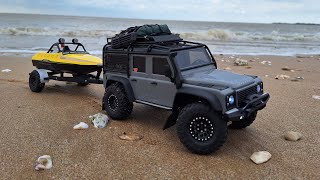 Traxxas TRX4M defender on the beach with boat trailer [upl. by Anawaj12]