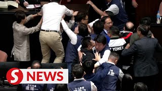 Taiwan lawmakers trade blows in bitter dispute over parliament reforms [upl. by Aerdma]