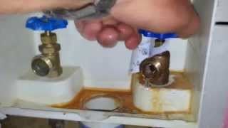 Plumbing Repairs Replacing Leaking Cold Water Screw on Laundry Valve Faucet [upl. by Ynohtnanhoj]