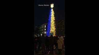 Christmas tree sparkles in dark Kyiv [upl. by Ientruoc]