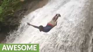 Daredevil dives off waterfall in epic slow motion [upl. by Plath252]