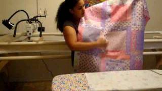 Longarm Machine Quilting Loading your quilt [upl. by Hebe617]