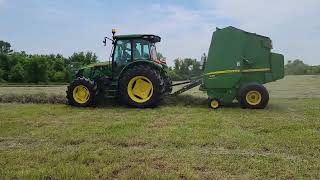 John Deere Tractors Cutting Tedding Raking Baling Hay [upl. by Powel]