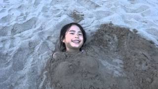 21 months Burying kids in sand on Seminyak Beach in Bali [upl. by Nivlag153]