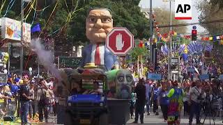 Floats parades and costumes as Israelis mark Purim festival [upl. by Hurff672]