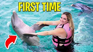 My FIRST TIME Swimming With Dolphins [upl. by Leamhsi]