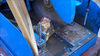 Cutting a Rock on a Lortone LS14 Lapidary Slab Saw w Spray Guard [upl. by Acinoev]