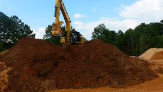 Caterpillar 336F L moving topsoil [upl. by Speroni]