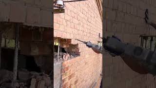 Loadbearing wall dismantling process with an electric pick for the brick house [upl. by Bussey122]