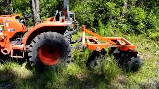 Landpride disc harrow on unbroken ground Kubota L2501 [upl. by Erica553]