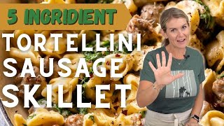 5 INGREDIENT Creamy Sausage Tortellini Skillet [upl. by Revert612]