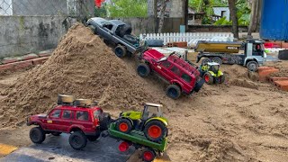 RC Toyota Land Cruiser transports tractors on difficult roads116 Scale Rc CarsOff Road… [upl. by Warfore866]