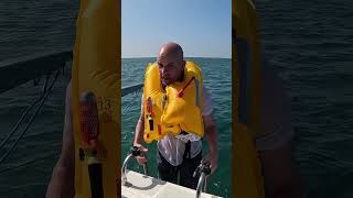 How do life jackets work when you fall overboard lifesavers lifehack boatlife [upl. by Kcirre]