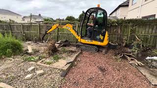 Digging out stumps on a bank holiday Monday landscaping digger stumps garden [upl. by Neitsirhc]