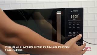 DEFY⎮How to set the digital clock on Microwave [upl. by Ynaffit]