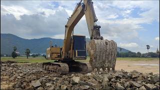 Caterpillar E120B Excavator Hard Pushing Rock and Unloading Heavy Trucks [upl. by Pall]