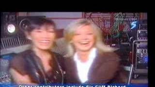 News Clip  Suns Duet With Olivia Newton John [upl. by Rehpotsrihc]