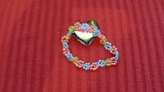 DIY Cómo hacer una pulsera con flores de chaquirones  mostacillas [upl. by Esertal87]