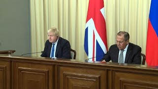 Johnson Lavrov exchange smiles and barbs on Moscow visit [upl. by Araiek]