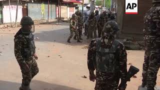 Kashmiri protesters and Indian security forces trade stones and tear gas [upl. by Barbabas]